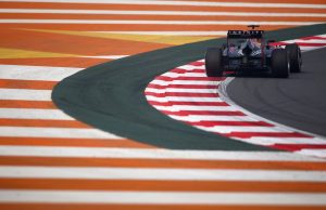 NOIDA, INDIA - OCTOBER 25: Sebastian Vettel of Germany and Infiniti Red Bull Racing drives during practice for the Indian Formula One Grand Prix at Buddh International Circuit on October 25, 2013 in Noida, India. (Photo by Clive Mason/Getty Images) *** Local Caption *** Sebastian Vettel