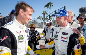Corvette Racing C7.R #3 drivers Antonio Garcia (left) and Jan Magnussen celebrate their GT LeMans class victory Saturday, April 12, 2014 during the TUDOR United SportsCar Championship race in Long Beach, California. It is the first victory for the Corvette C7.R. (Photo by Richard Prince for Corvette Racing)