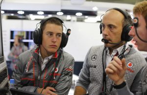 Stoffel Vandoorne with Phil Prew and Oliver Turvey in the garage.