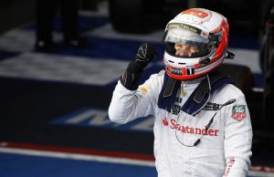 Kevin Magnussen celebrates his podium finish