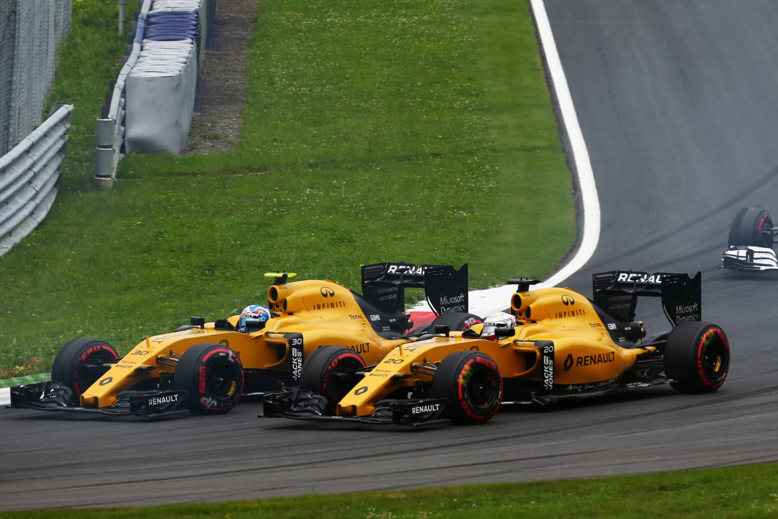 Jolyon Palmer (GBR) Renault Sport F1 Team RS16 and team mate Kevin Magnussen (DEN) Renault Sport F1 Team RS16 at the start of the race. Austrian Grand Prix, Sunday 3rd July 2016. Spielberg, Austria.